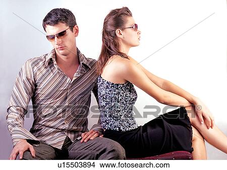 Picture - relaxation, couples, sitting, mate, well dressed, legs. Fotosearch