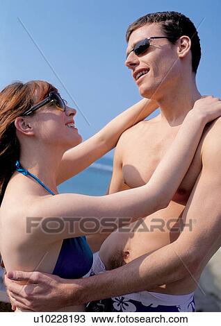 romance, sand, day, standing, emotion, mid adult man View Large Photo Image Stock Image - romance, sand, day, standing, emotion, mid adult man. Fotosearch