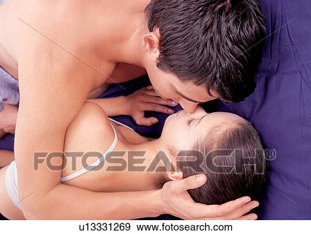 sleeping, hand on head, togetherness, indoor, culture, black hair, two people View Large Photo Image Stock Photo - sleeping, hand on head, togetherness, indoor, culture, black hair, two people. Fotosearch