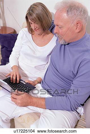 Picture - togetherness, senior man, love, senior woman, leisure activity. Fotosearch