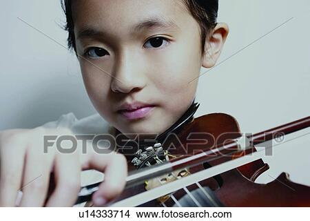 Asian Ethnicity, Close-Up, Child, Casual Clothing, 6-7 Years View Large Photo Image Picture - Asian Ethnicity, Close-Up, Child, Casual Clothing, 6-7 Years. Fotosearch