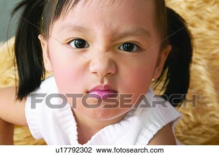 Black Hair, Eastern, One Child Only, Facial Expression, Childhood View Large Photo Image Stock Image - Black Hair, Eastern, One Child Only, Facial Expression, Childhood. Fotosearch