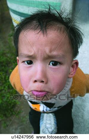 Black Hair, Human Face, Facial Expression, Outdoor, Day, Close-Up, One Person View Large Photo Image Stock Photograph - Black Hair, Human Face, Facial Expression, Outdoor, Day, Close-Up, One Person. Fotosearch