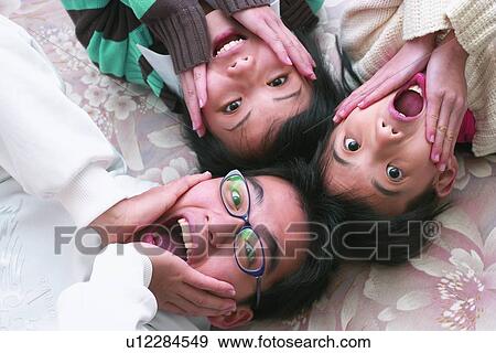 Stock Photo - Black Hair, Tween, Close-Up, Sibling, Lifestyles. Fotosearch