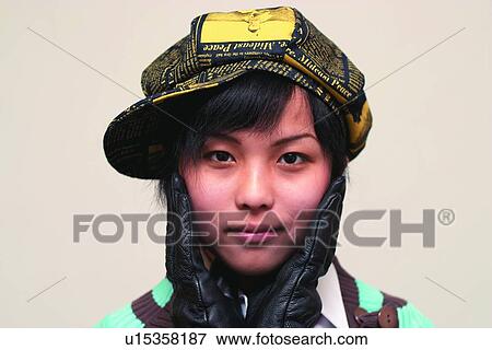 Stock Photo - Child, Asian Ethnicity, Cheek, Casual Clothing, Black Hair, Close-Up, 6-7 Years. Fotosearch