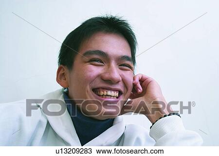 Stock Image - Child, Asian Ethnicity, Cheerful, Casual Clothing, Black Hair, Close-Up, 10-11 Years. Fotosearch