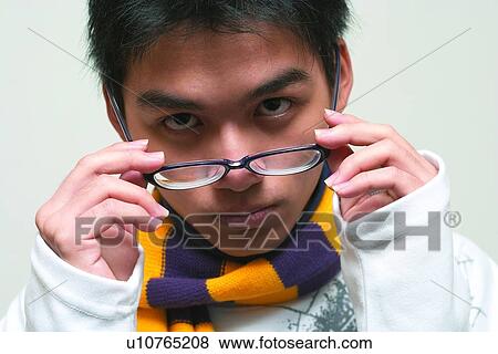 Stock Photo - Close-Up, Asian Ethnicity, Child, Casual Clothing, Black Hair, 10-11 Years. Fotosearch