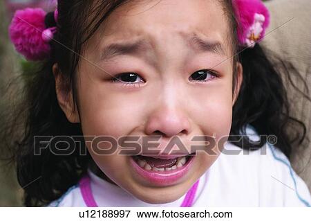 Stock Photo - Close-Up, Asian Ethnicity, Child, Casual Clothing, Brown Hair, 3-4 Years. Fotosearch
