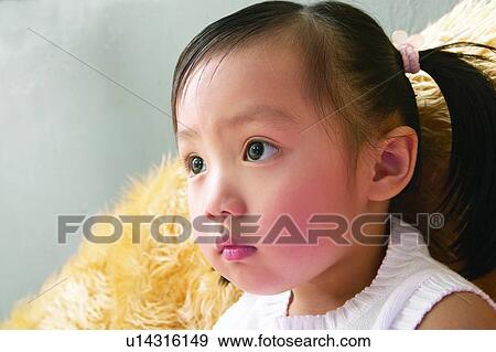 Stock Photo - Close-Up, Asian Ethnicity, Child, Casual Clothing, Brown Hair, 3-4 Years. Fotosearch