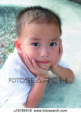 Stock Photo - Close-Up, Asian Ethnicity, Child, Casual Clothing, Black Hair, 3-4 Years. Fotosearch
