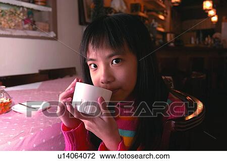 Stock Image - Cup, Holding, Confidence, Asian Ethnicity, Long Hair, 6-7 Years. Fotosearch