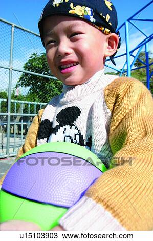 Stock Image - East, One Boy Only, Kids Life, Playful, Child, Outdoor. Fotosearch