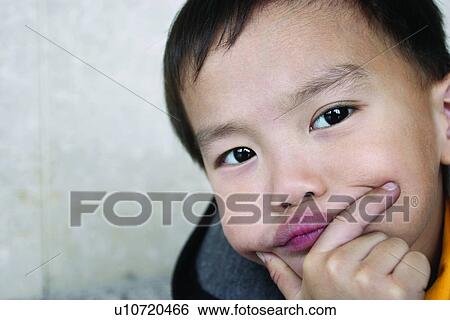 Hand On Chin, 3-4 Years, Looking At Camera, Close-Up, Indoor, Contemplation View Large Photo Image Stock Photograph - Hand On Chin, 3-4 Years, Looking At Camera, Close-Up, Indoor, Contemplation. Fotosearch