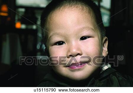 Stock Image - Happiness, Close-Up, One Baby Boy Only, Innocence, Asian Ethnicity, Focus On Foreground. Fotosearch