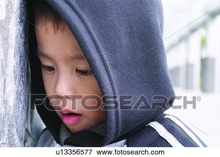 Innocence, Lifestyles, One Boy Only, Hooded Shirt View Large Photo Image Stock Photo - Innocence, Lifestyles, One Boy Only, Hooded Shirt. Fotosearch