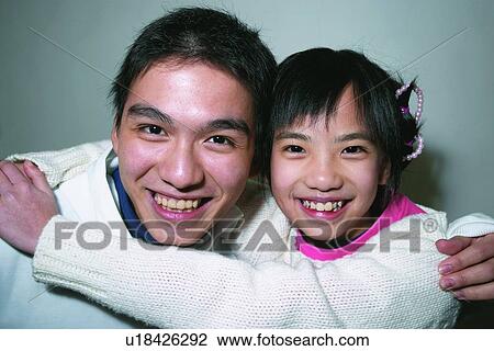 Stock Image - Looking At Camera, 10-11 Years, Childhood, Two People, Love. Fotosearch