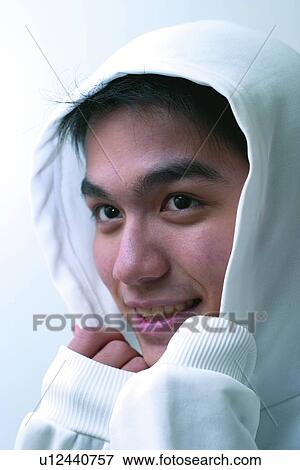 Looking Away, Eastern, Asian Ethnicity, Indoor, Holding, Human Face, 10-11 Years View Large Photo Image Stock Photo - Looking Away, Eastern, Asian Ethnicity, Indoor, Holding, Human Face, 10-11 Years. Fotosearch