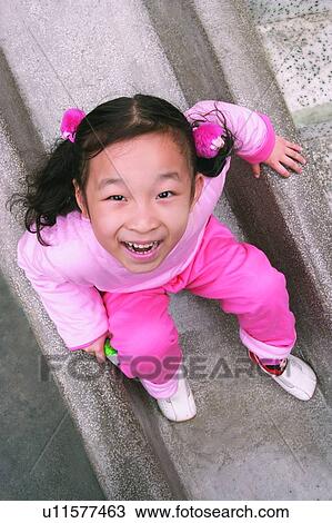 Looking Up, Looking At Camera, Portrait, Brown Hair, Casual Clothing, Childhood View Large Photo Image Stock Image - Looking Up, Looking At Camera, Portrait, Brown Hair, Casual Clothing, Childhood. Fotosearch