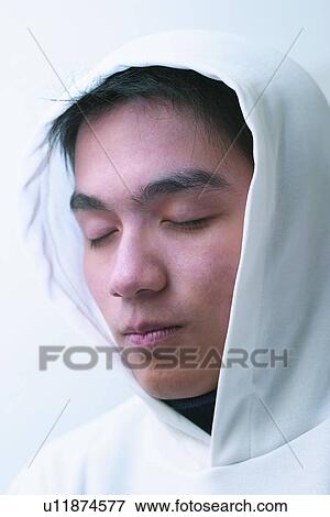 Stock Photo - White Background, Lifestyles, One Boy Only, Child, Eastern, Relaxation, Contemplation. Fotosearch