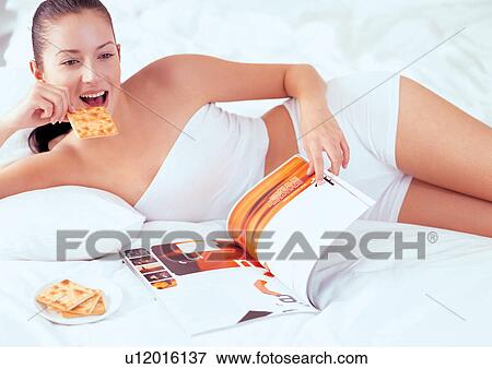 bed, single, cookies, refreshment, one person, cheerful, hair View Large Photo Image Stock Photo - bed, single, cookies, refreshment, one person, cheerful, hair. Fotosearch