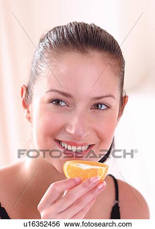 Stock Photograph - brown hair, cheerful, close-up. Fotosearch