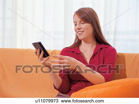 couch, indoor, leisure new generation, single, smiling, sofa View Large Photo Image Stock Image - couch, indoor, leisure new generation, single, smiling, sofa. Fotosearch