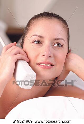 Stock Photo - cushion, cordless phone, sole, bedding, wireless. Fotosearch