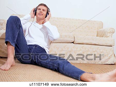 happiness, recreation, casual clothing, carpet, phones, sole View Large Photo Image Stock Photo - happiness, recreation, casual clothing, carpet, phones, sole. Fotosearch