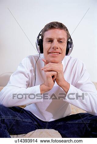 happy, resting, phones, indoor, jeans, content, brown hair View Large Photo Image Picture - happy, resting, phones, indoor, jeans, content, brown hair. Fotosearch