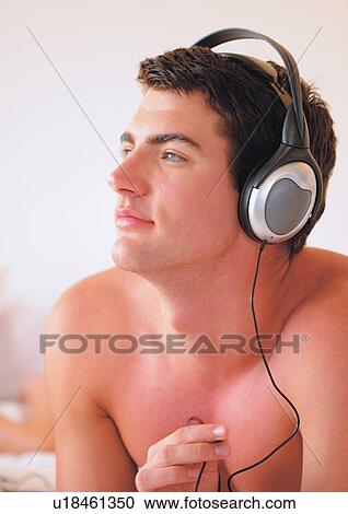 Stock Image - headphones, earphones, phones, content. Fotosearch