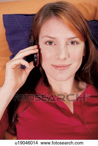 looking at camera, cell, portrait, happy, phone, smiling, one person View Large Photo Image Picture - looking at camera, cell, portrait, happy, phone, smiling, one person. Fotosearch