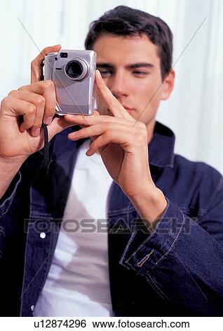 young man, brown hair, youthful View Large Photo Image Stock Photograph - young man, brown hair, youthful. Fotosearch
