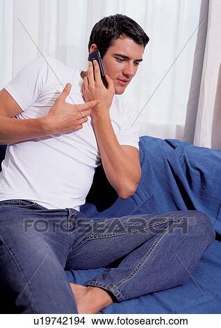 Picture - young, t-shirt, single, sole, cellular, day. Fotosearch