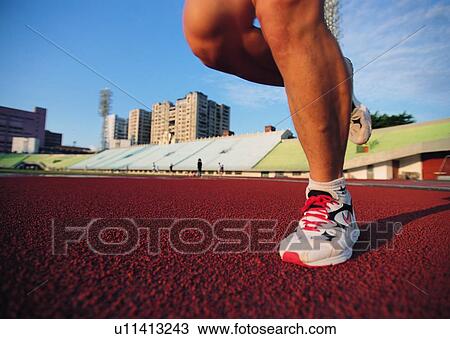 Stock Image - leisure, track, sunset, race, recreation, sport, exercise. Fotosearch