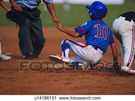 Stock Image - player, leisure, baseball, umpire, recreation, sliding base. Fotosearch