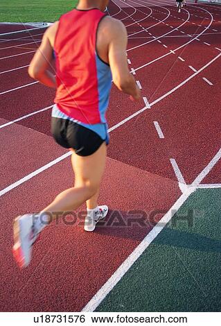 Stock Photograph - race, running, recreation, exercise, leisure, racer, sunset. Fotosearch