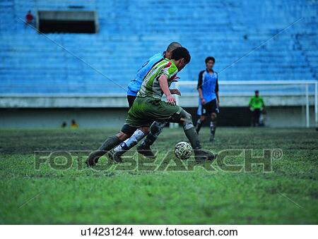 Picture - soccer, recreation, soccer ball, leisure, football, exercise. Fotosearch