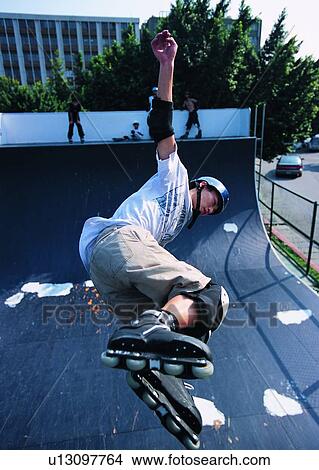Picture - sport, recreation, leisure, exercise, skate, skater. Fotosearch