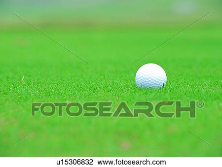 Stock Image - sport, recreation, leisure, exercise, golf, golfball. Fotosearch