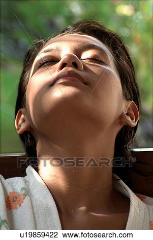 Stock Image - Black Hair, Close-Up, Casual Clothing, Asian Ethnicity. Fotosearch