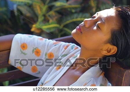 Female Beauty, Close-Up, Bali, Beauty, Pampering, Head And Shoulders View Large Photo Image Stock Photograph - Female Beauty, Close-Up, Bali, Beauty, Pampering, Head And Shoulders. Fotosearch