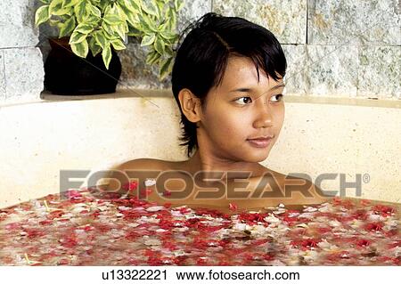 Stock Image - Petal, Close-Up, One Person, Relaxation, Getting Away From It All. Fotosearch