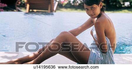 Vacations, Indonesia, Content, Looking At Camera, Female Beauty View Large Photo Image Stock Photograph - Vacations, Indonesia, Content, Looking At Camera, Female Beauty. Fotosearch