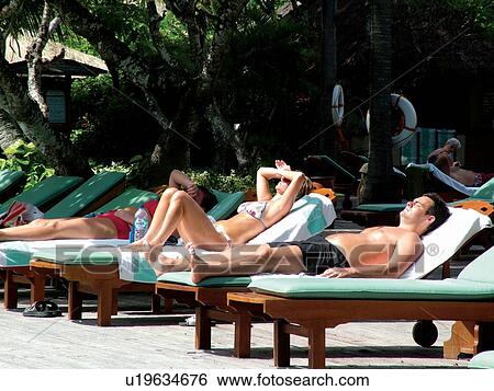Day, Tourist Resort, Group Of People, Shadow, Lying Down, Bikini View Large Photo Image Stock Photograph - Day, Tourist Resort, Group Of People, Shadow, Lying Down, Bikini. Fotosearch