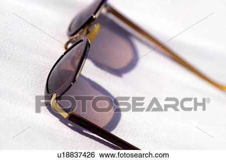 Stock Photograph - Sunglasses, Tinted Sunglasses, One Object, Ideas, Summer Style, White Background, Summer. Fotosearch
