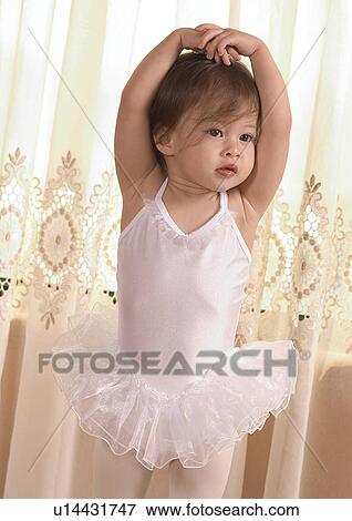 Close-up of a girl in a tutu View Large Photo Image Stock Photo - Close-up of a girl in a tutu. Fotosearch