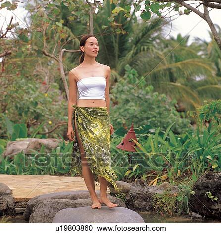 Stock Image - bodycare, garden, lifestyle, leisure activity, path, care, bare foot. Fotosearch