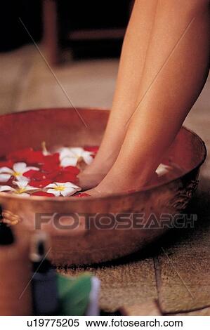 Stock Photography - human legs, lifestyle, care, spa treatment, idyllic. Fotosearch