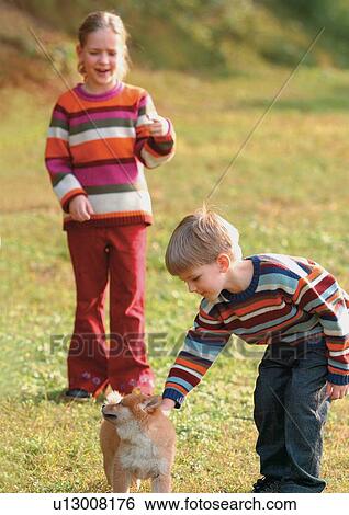 bending, brother, blonde hair, affectionate View Large Photo Image Stock Photograph - bending, brother, blonde hair, affectionate. Fotosearch