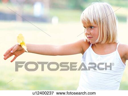 blonde hair, butterfly, carefree, casual View Large Photo Image Stock Photo - blonde hair, butterfly, carefree, casual. Fotosearch